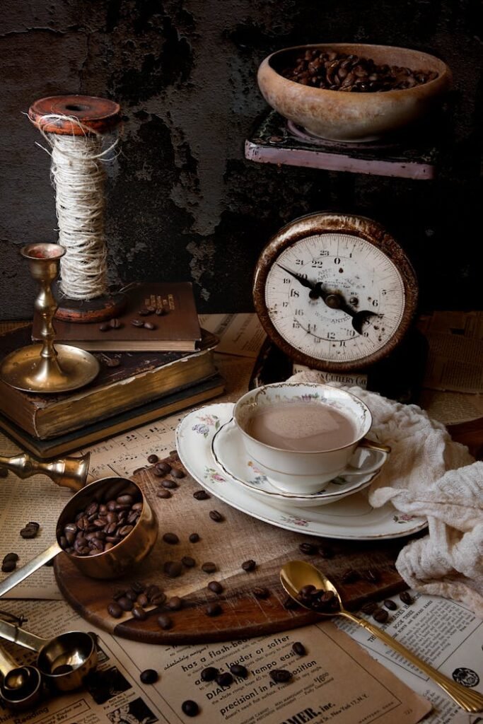 pexels-photo-1254655 Rustic setup with coffee beans, antique scale, and vintage brass accents creating a cozy atmosphere.